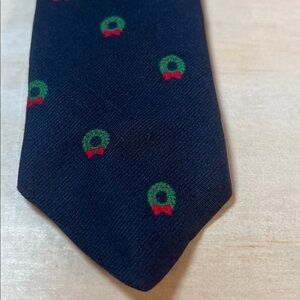 Navy Blue Tie with Green and Red Christmas wreaths.